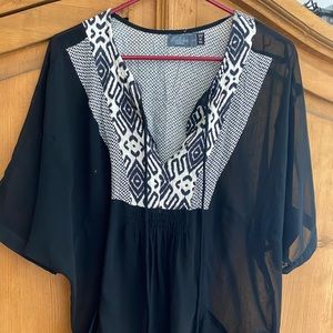 Costa Blanca semi sheer flowy top